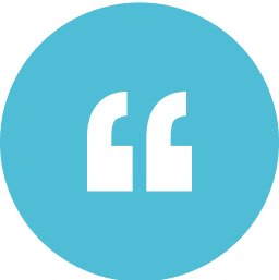 Blue circle with white quotation marks.